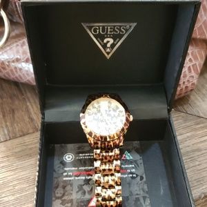 Gold leopard Guess watch